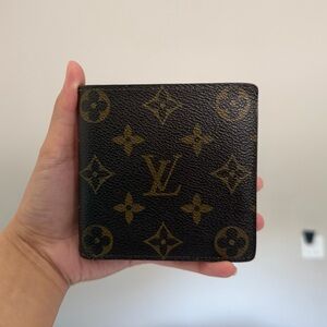 Authenticated Louis Vuitton Monogram Bi-fold Marco Wallet